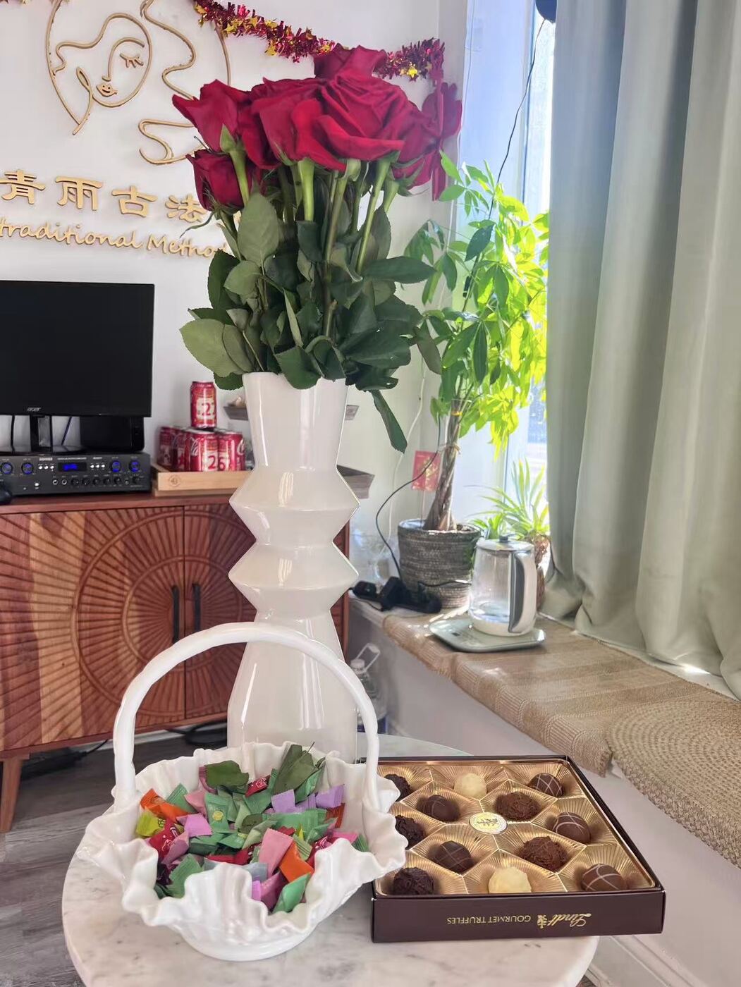 Reception lounge with fresh flowers at Eastern Head Spa in Mineola, Long Island