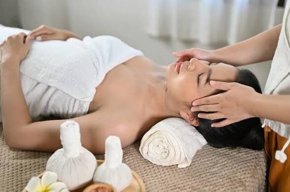 Herbal head therapy with warm herbal compress, part of a two hour spa package in Mineola